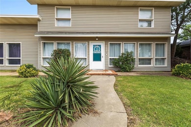 View of front of home featuring a front yard