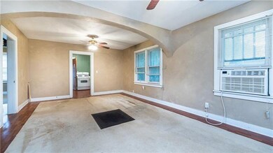 Living Room closest to you, then dining area.