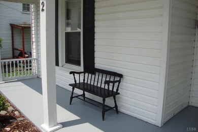 NICE FRONT PORCH FOR RELAXING.