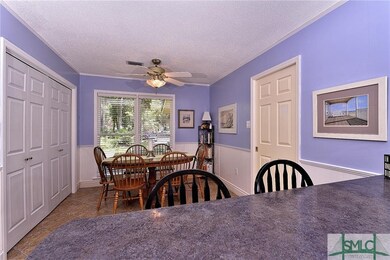 Another counter for seating.  Kitchen opens to the