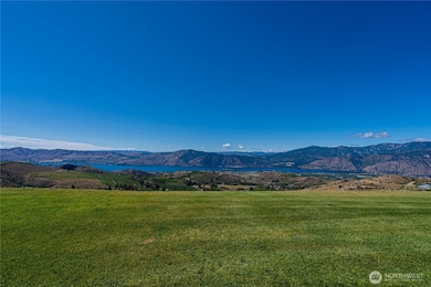 Luscious lawn overlooking the view of Lake Chelan, Manson orchards, Wapato Point and the mountains