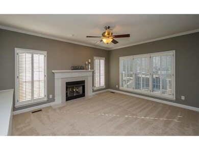 Great room with plantation shutters