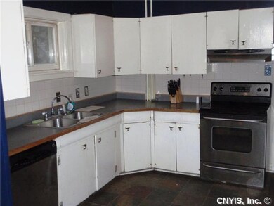 Kitchen Stainless Steel appliances with a Stone & 