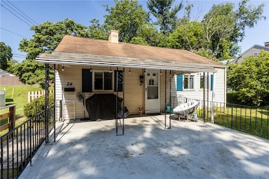 The partial covered front porch is massive in size