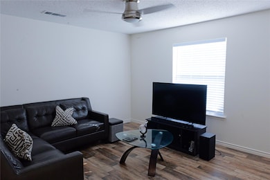 Living room featuring hardwood / wood-style floors
