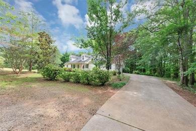 View of front of property with driveway