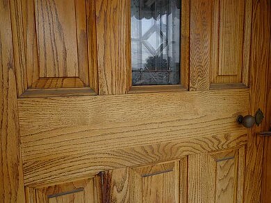 Exterior Front. Beautiful wood front door!