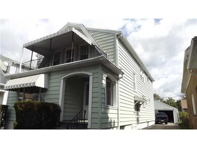 Exterior Front. Maintenance free vinyl sided.