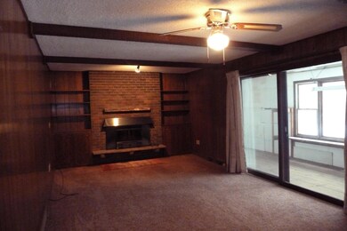 Main Floor Family Room with Fireplace<|>
