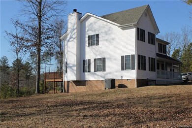 Beautifully setting on four private acres!
