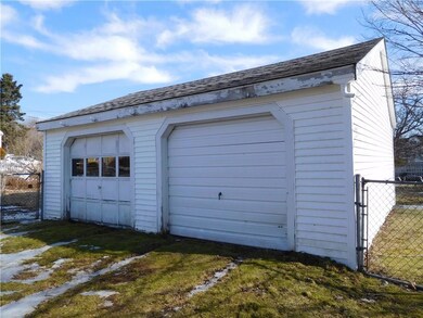 This garage has storage room along...