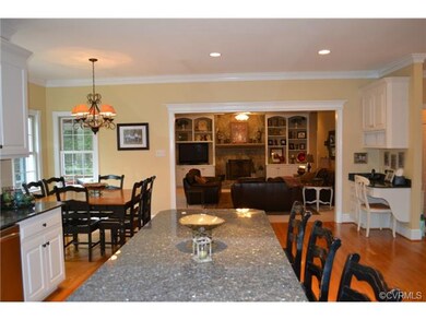 Kitchen overlooks sunken family room! Convenient d