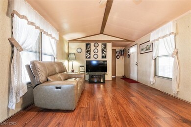 Living area featuring wood finished floors