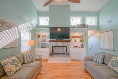 Den with gas fireplace