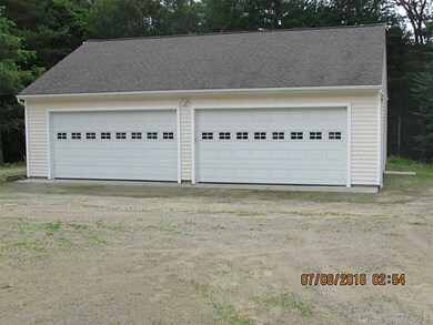 Parking Lot/Garage. 4 bays plus large room in the