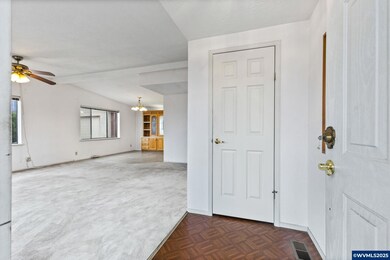 Front door opens into the living room.