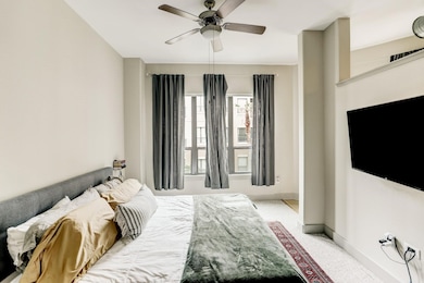 Spacious primary bedroom with walk-in closet and en-suite bathroom.