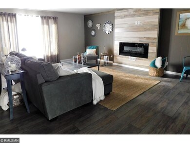 Extra large living room adjacent to kitchen offers