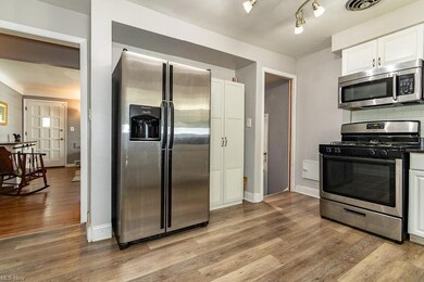 Kitchen with LVP and SS appliances