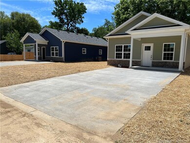 Massive driveway to accommodate up to 4 cars.