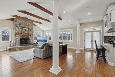 Living Room w/ Wood Burning Fireplace