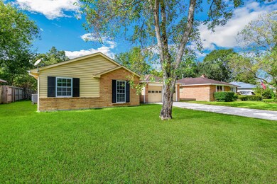 Welcome to 312 Stratmore located in Friendswood, Texas. This expansive lot has over 15,000SF and lots of light and charm.