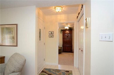 Entry with double closet.