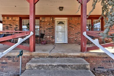 Property entrance with a porch