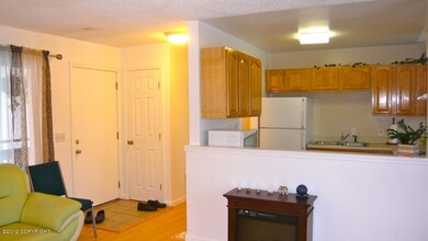 Living room to entry, kitchen