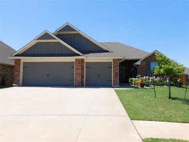 View of front of house with an attached garage, co