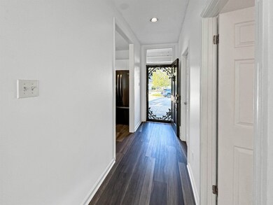 Interior space featuring dark hardwood / wood-styl