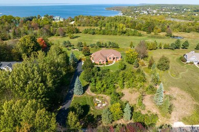Drone View of home and distant waters