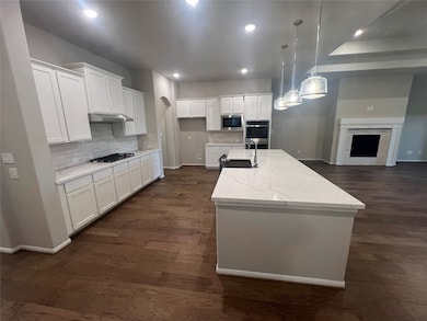 Lovely white cabinets and quartz countertops