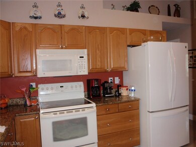 Granite Counters and wood cabinets , brand new fri