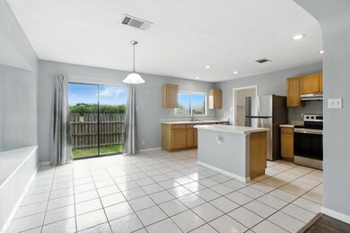 Kitchen with stainless steel appliances, under ca