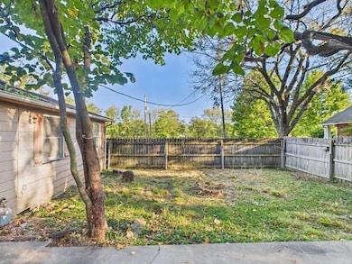 View of fenced backyard