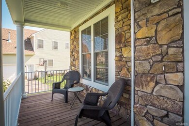 Lower porch with stone details, low maintenance me