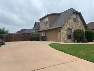 View of front facade featuring a front lawn and a 