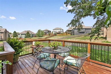 The spacious back deck leads to the professionally