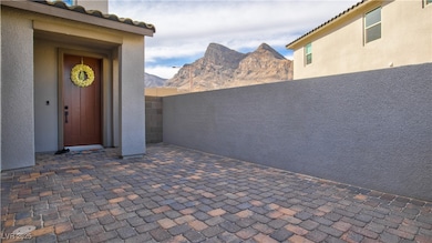 View of patio / terrace with fence and a mountain