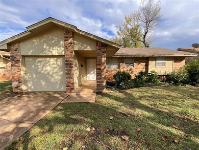 View of front of property featuring a front lawn a