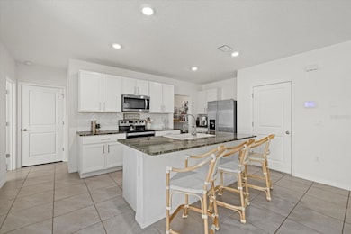 31386 Penny Surf Loop, Wesley Chapel, FL 33545 - photo 7