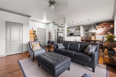 Spacious open floor plan with elegant gray trim details and modern lighting accents for a refined look.