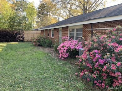 Huge fully fenced back yard with mature trees
