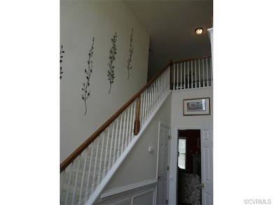 Entrance from front door.  Wainscott and tall ceil