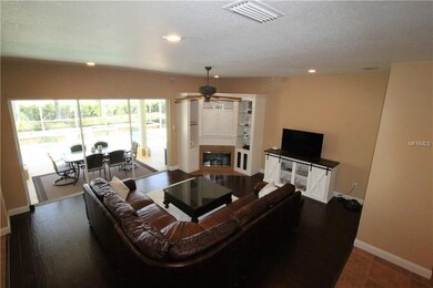 Family Room with gas fireplace and pocket sliding 