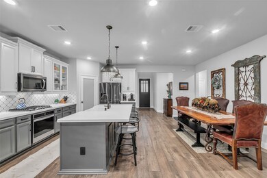 Kitchen island has been custom wrapped.