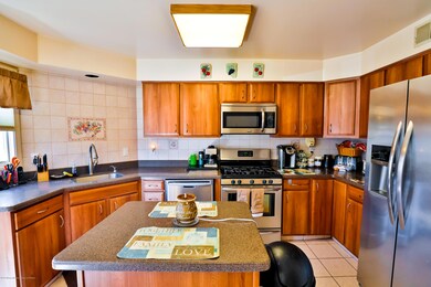 CENTER ISLAND & STAINLESS APPLIANCES
