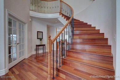Brazilian Cherry Floor & Cast Iron Rail