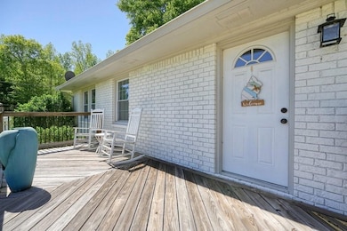 Property entrance with brick siding
